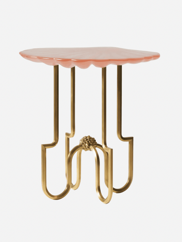 Image may contain: Furniture, Table, Coffee Table, Electronics, Hardware, Dining Table, Chandelier, and Lamp