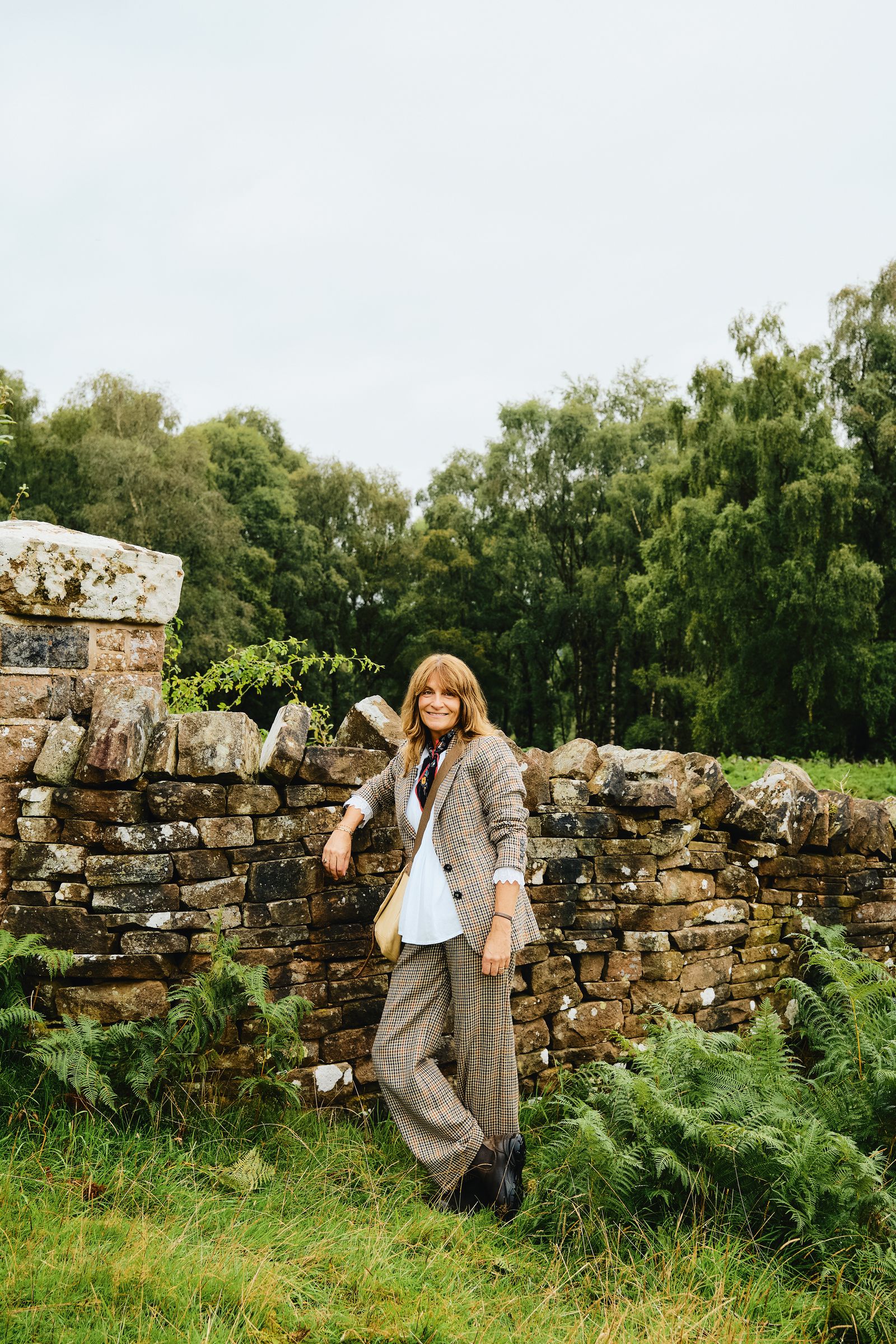 Image may contain Accessories Bag Handbag Adult Person Face Head Clothing Footwear Shoe Outdoors and Nature