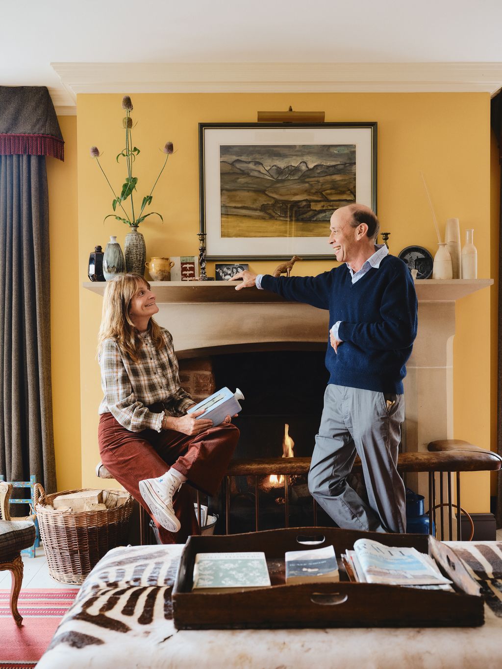 Image may contain Art Painting Clothing Footwear Shoe Adult Person Teen Architecture Building and Furniture