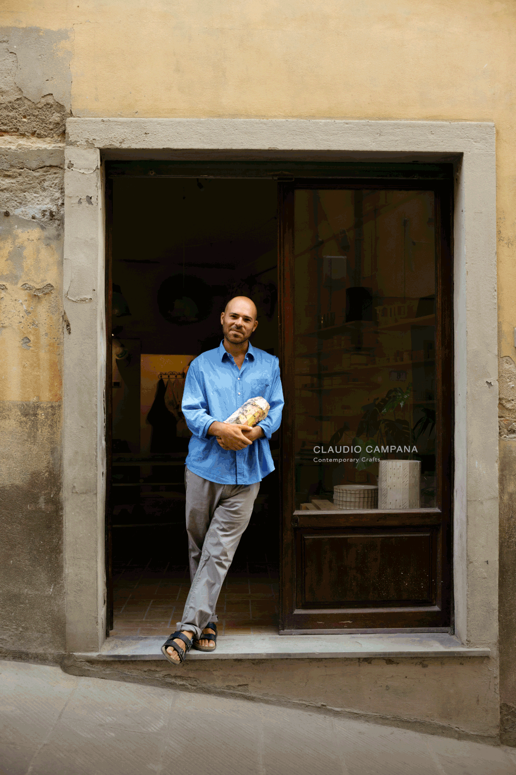 Claudio Campana outside his studioshop in Castelfiorentino with one of his vessels.
