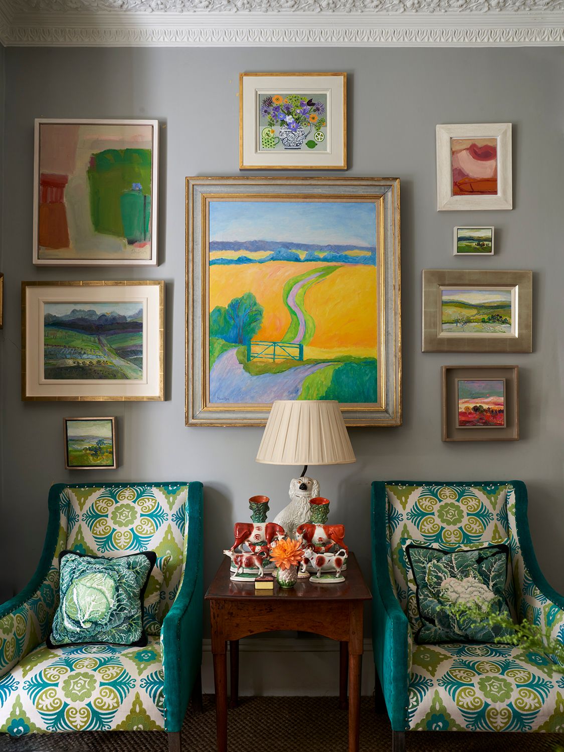 Image may contain Art Painting Chair Furniture Lamp Home Decor Desk Table and Plate