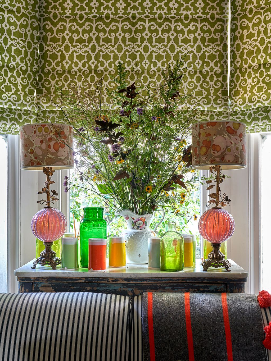 Image may contain Lamp Window Windowsill Cup Couch and Furniture