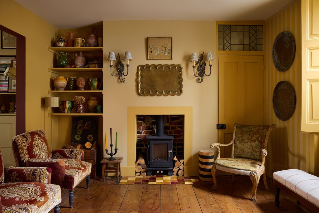 Image may contain Architecture Building Furniture Indoors Living Room Room Home Decor Chair and Lamp