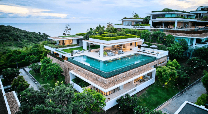 Image may contain Pool Water Swimming Pool Outdoors Architecture Building House Housing Villa and Aerial View