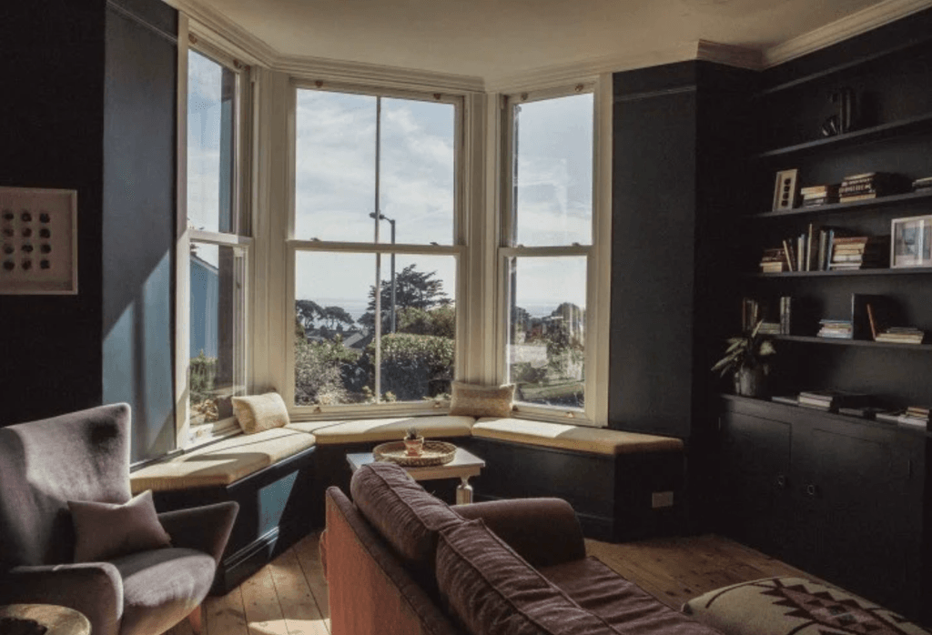 Image may contain Window Bay Window and Plant