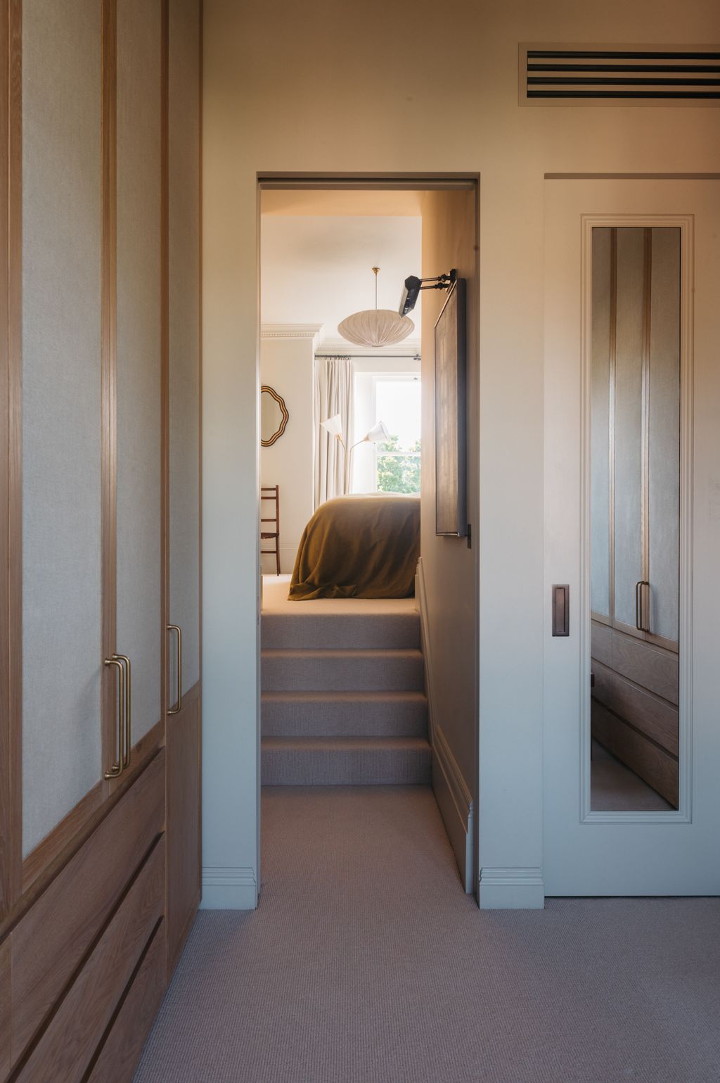 Image may contain Corner Indoors Interior Design Door Architecture Building House Housing Staircase and Chair