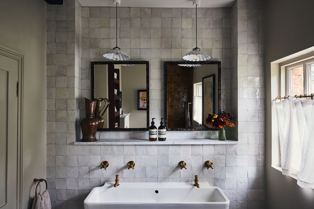 Image may contain Lamp Sink Sink Faucet Bathing Bathtub Person Tub Art and Painting