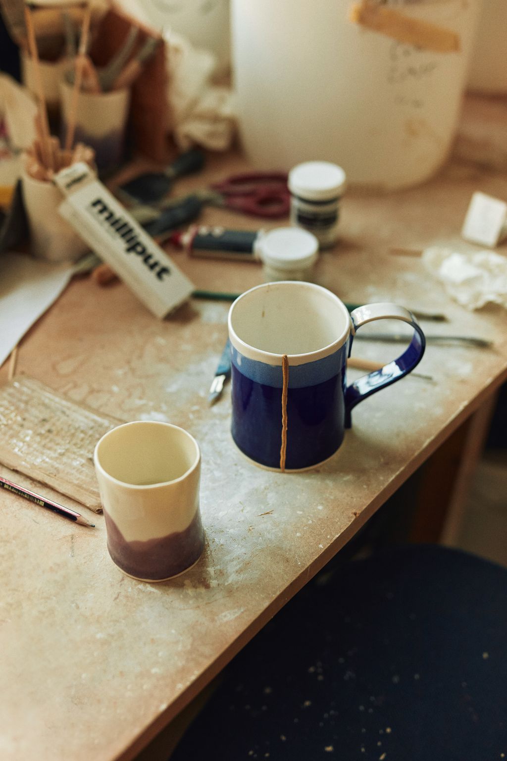 Image may contain Cup Furniture Table Pen Beverage Coffee Coffee Cup and Tabletop