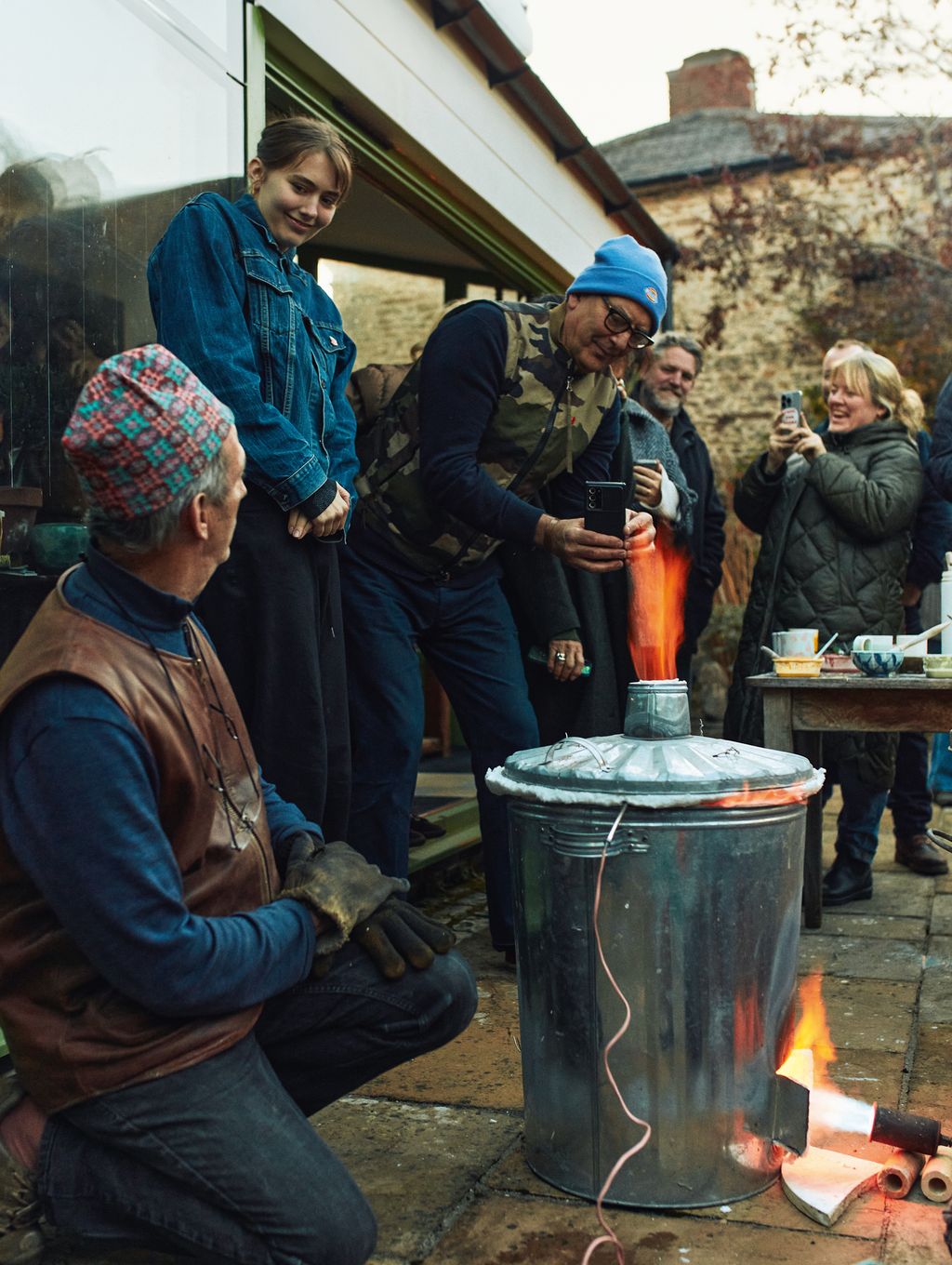 Image may contain Adult Person Clothing Glove Footwear Shoe Hat Pants Accessories Glasses and Electronics