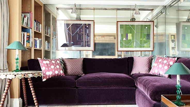 Image may contain: Couch, Furniture, Lamp, Architecture, Building, Indoors, Living Room, Room, Home Decor, and Rug