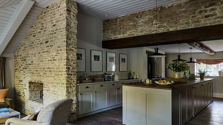 Image may contain: Indoors, Interior Design, Kitchen, Lamp, Chair, Furniture, Plant, Architecture, Building, and House