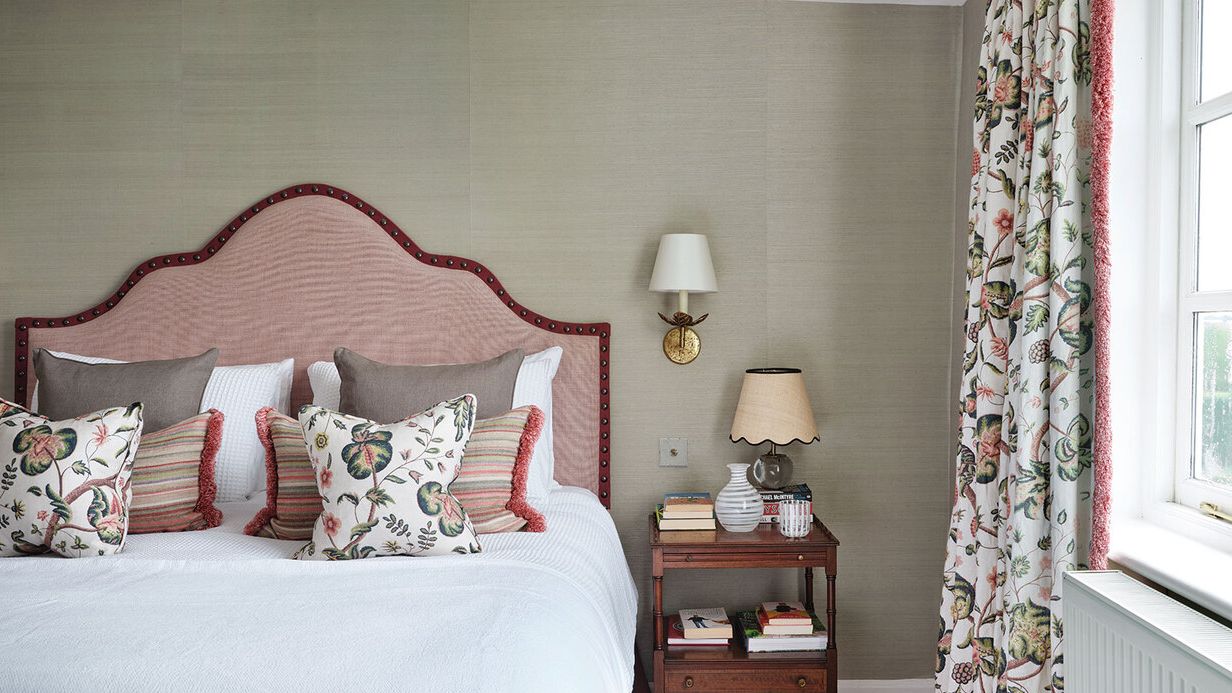 Image may contain: Cushion, Home Decor, Lamp, Bed, Furniture, Pillow, Table Lamp, Indoors, Interior Design, and Book