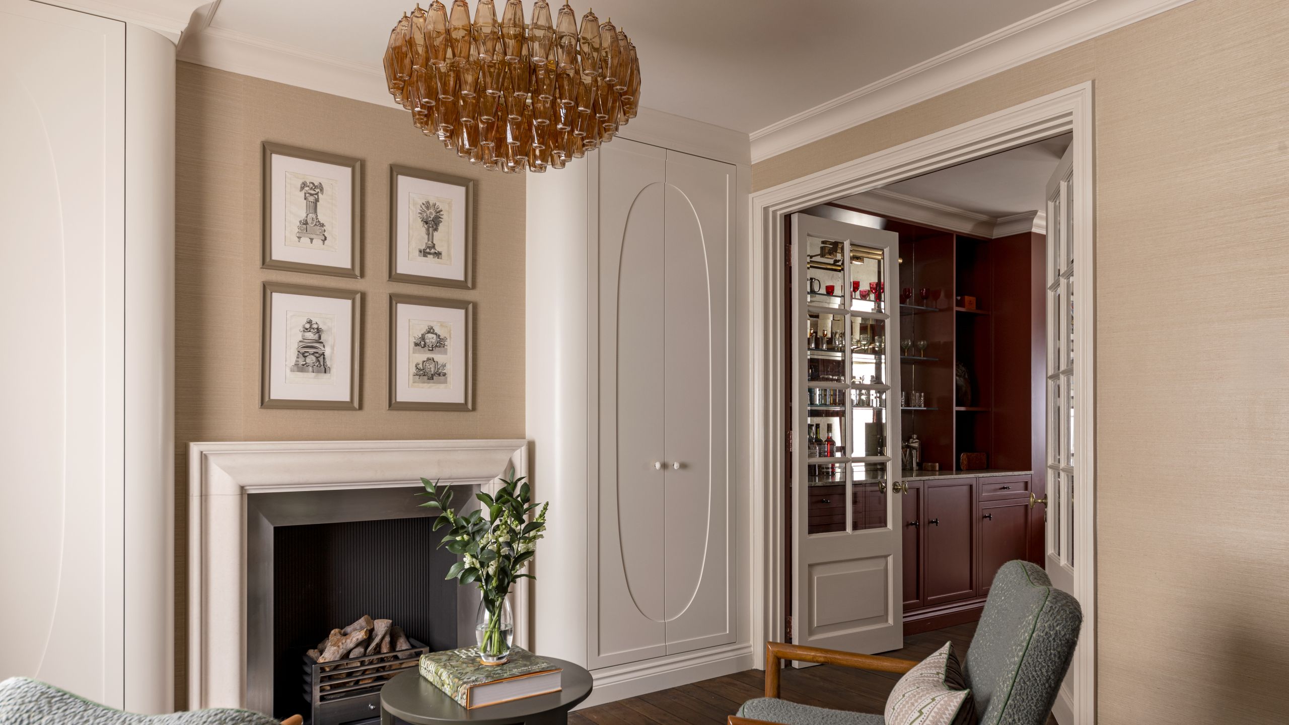 Image may contain: Chandelier, Lamp, Architecture, Building, Furniture, Indoors, Living Room, Room, and Home Decor