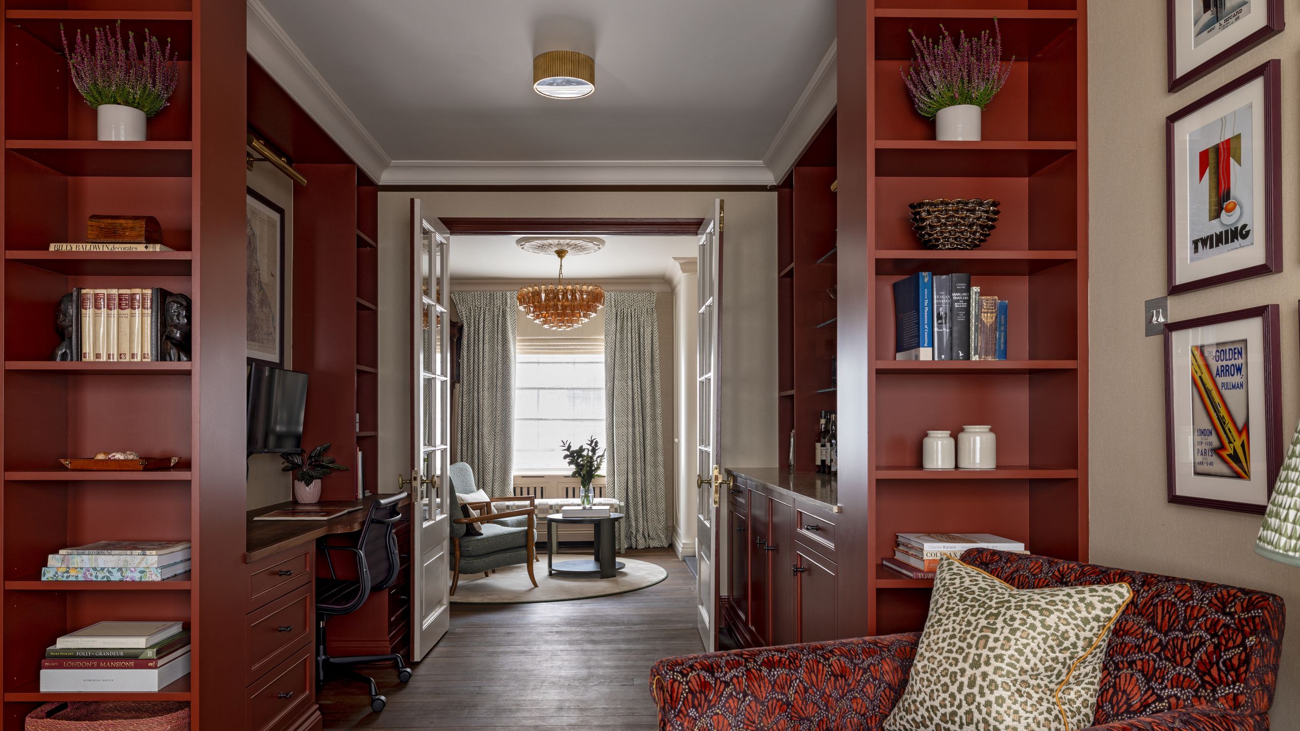 Image may contain: Lamp, Home Decor, Architecture, Building, Furniture, Indoors, Living Room, Room, Couch, Chair, and Plant