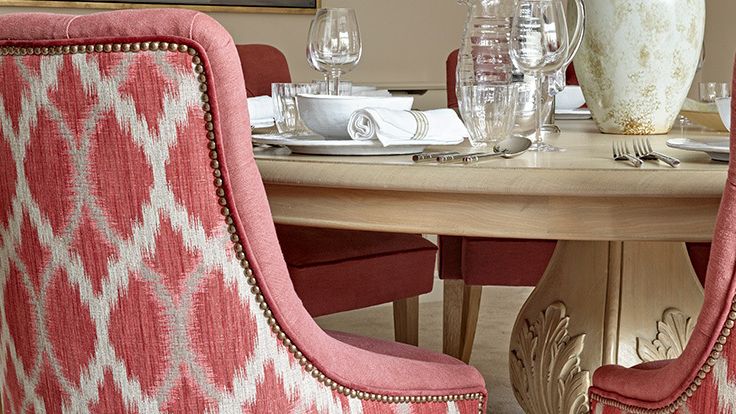 Image may contain: Home Decor, Furniture, Chair, Cutlery, Fork, Cup, Cushion, Rug, Spoon, Table, Adult, Person, and Wedding