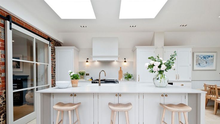 Image may contain: Indoors, Interior Design, Kitchen, Kitchen Island, Bar Stool, and Furniture