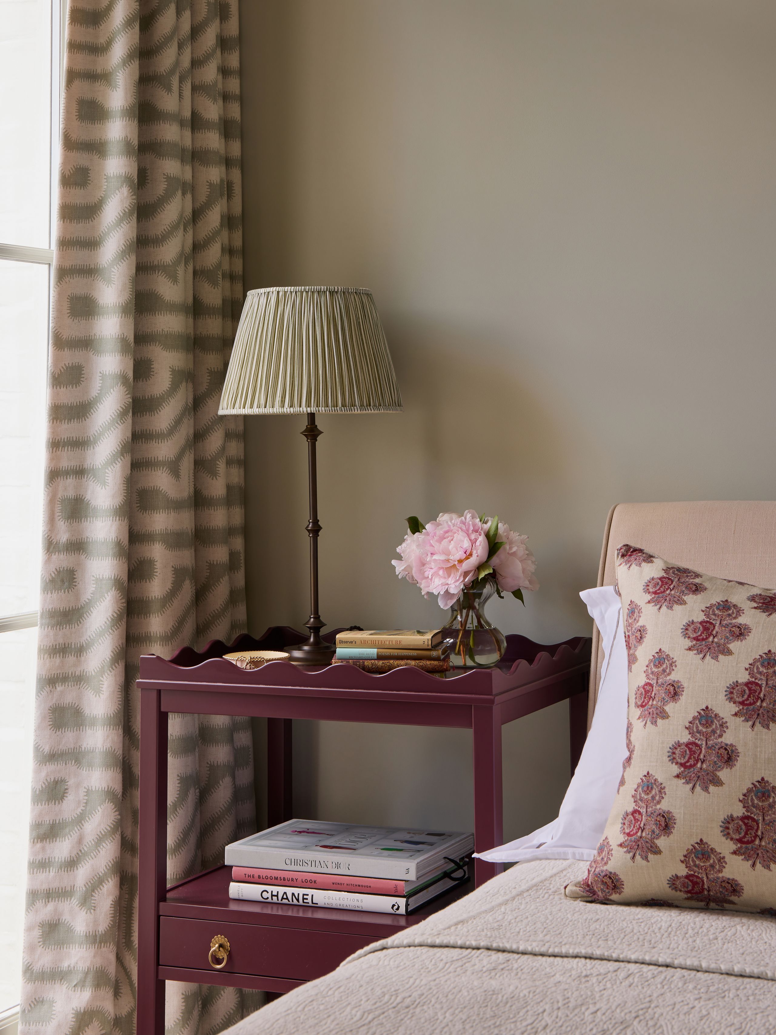 Image may contain: Cushion, Home Decor, Lamp, Table Lamp, Pillow, Bed, and Furniture