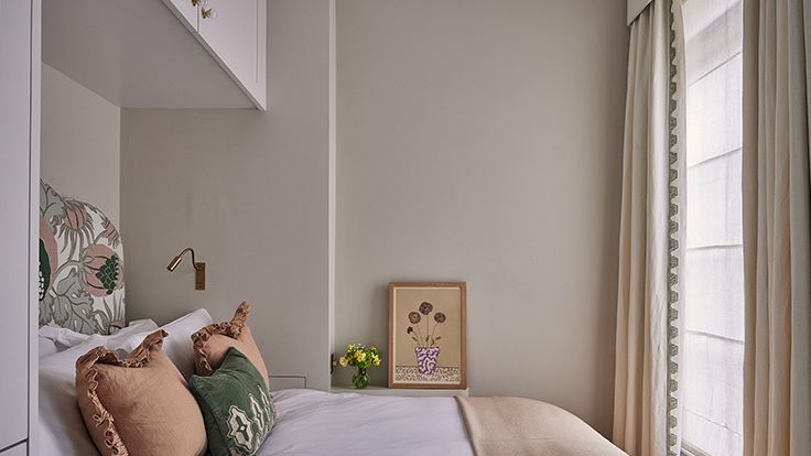 Image may contain: Cushion, Home Decor, Art, Painting, Lamp, Pillow, Bed, Furniture, Indoors, Interior Design, and Bedroom