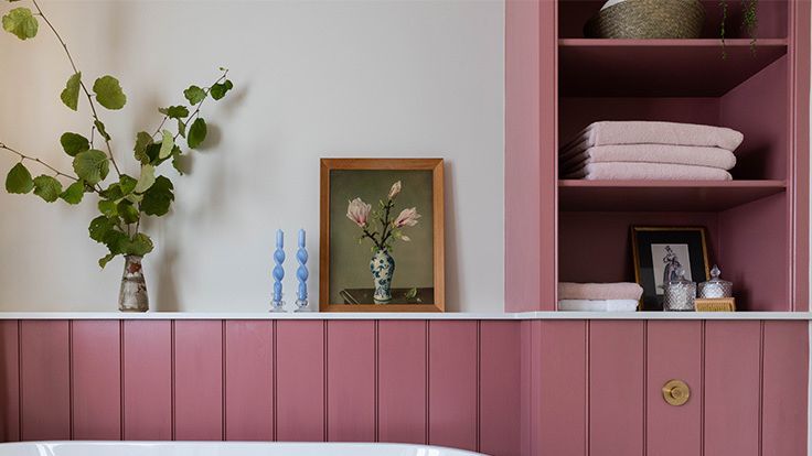 Image may contain: Indoors, Interior Design, Plant, Potted Plant, Bathing, Bathtub, Person, Tub, Art, Painting, and Flower