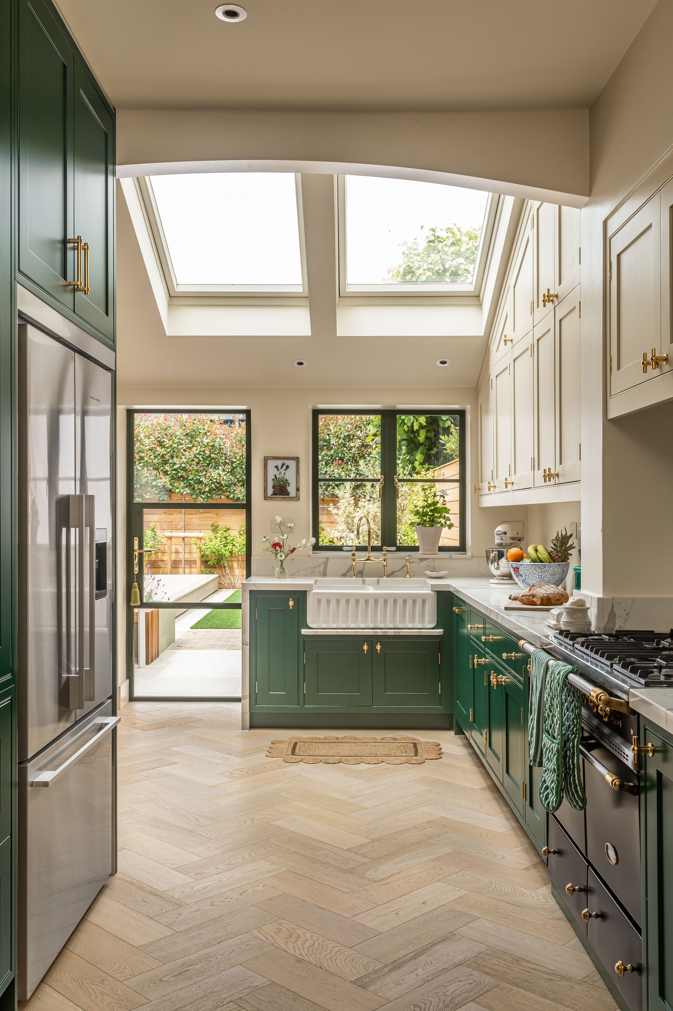 Image may contain: Floor, Indoors, Interior Design, Window, Kitchen, Plant, Sink, Home Decor, Rug, Architecture, and Building