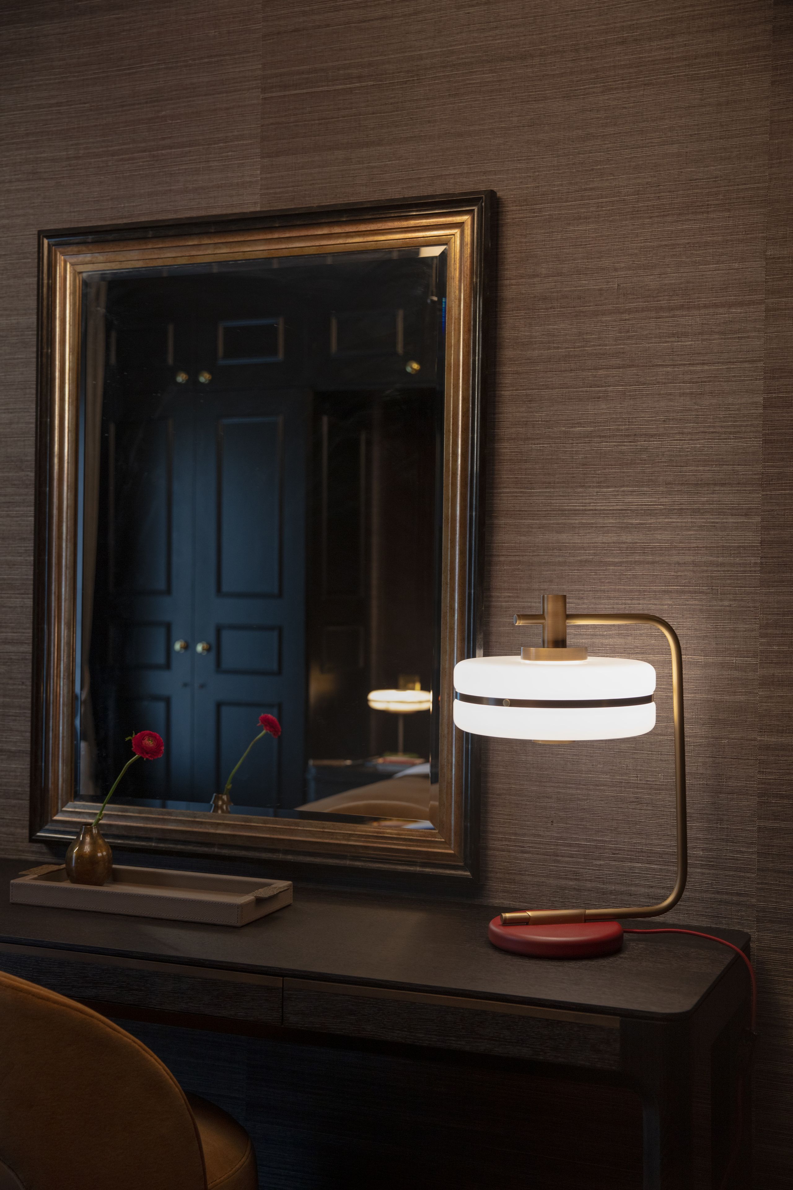 Image may contain: Lamp, Indoors, Interior Design, Chair, and Furniture