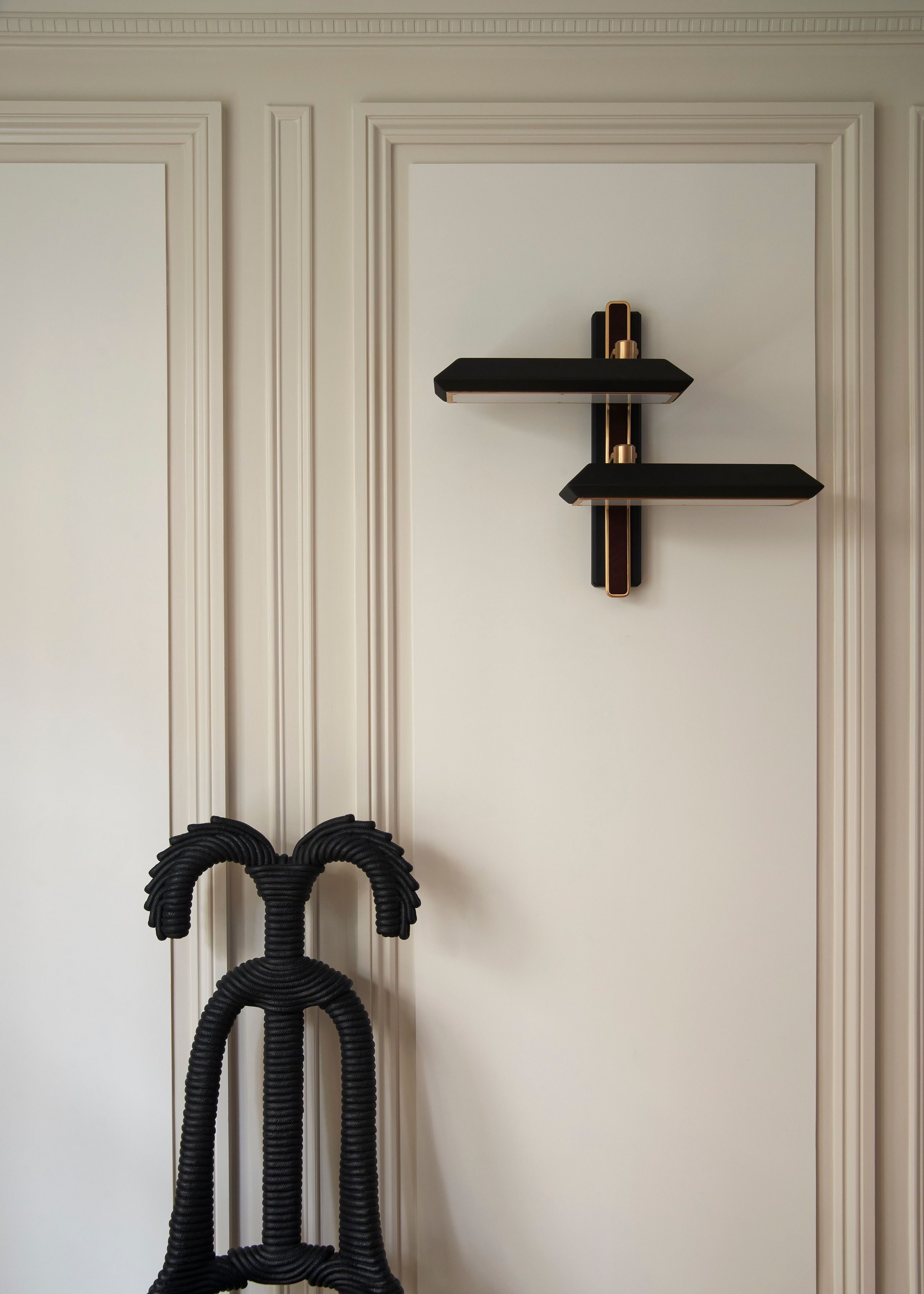 Image may contain: Indoors, Interior Design, Shelf, Corner, and Door