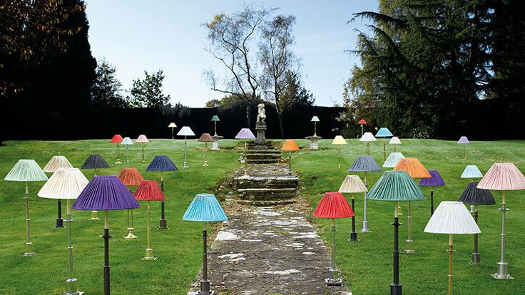 Image may contain: Grass, Plant, Nature, Outdoors, Park, Lawn, Lamp, Architecture, Building, House, Housing, and Patio