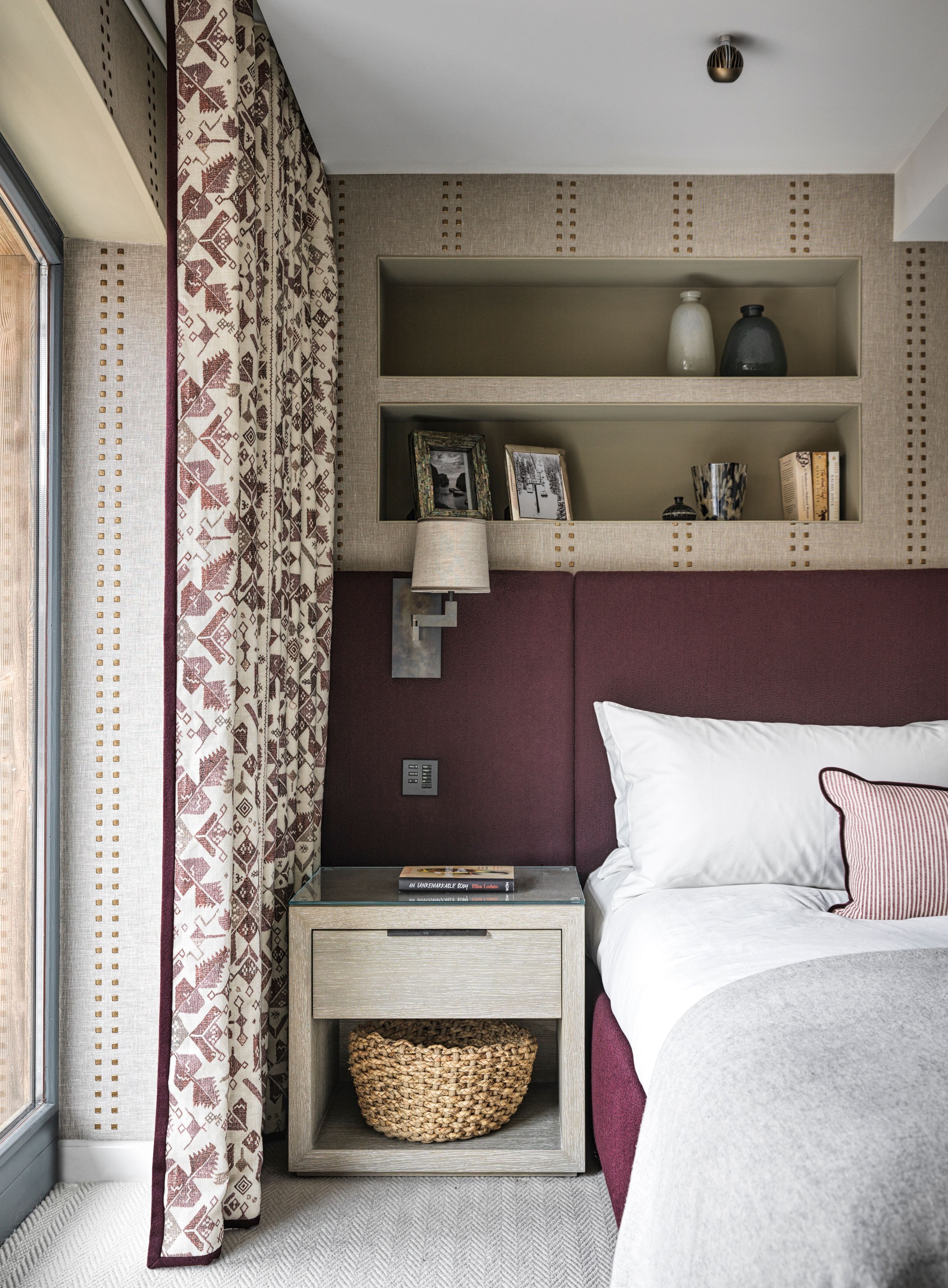 Image may contain: Home Decor, Indoors, Interior Design, Cushion, Lamp, Cup, Furniture, Art, Painting, Book, and Publication