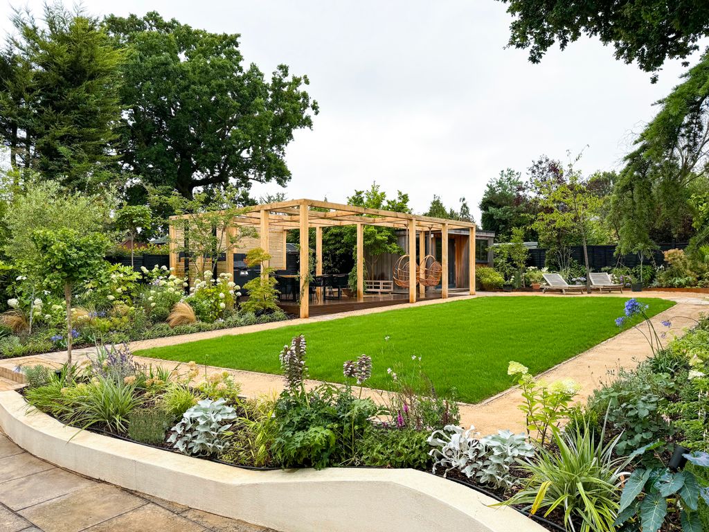 Image may contain Garden Nature Outdoors Grass Plant Backyard Yard Park Lawn Chair Furniture and Architecture