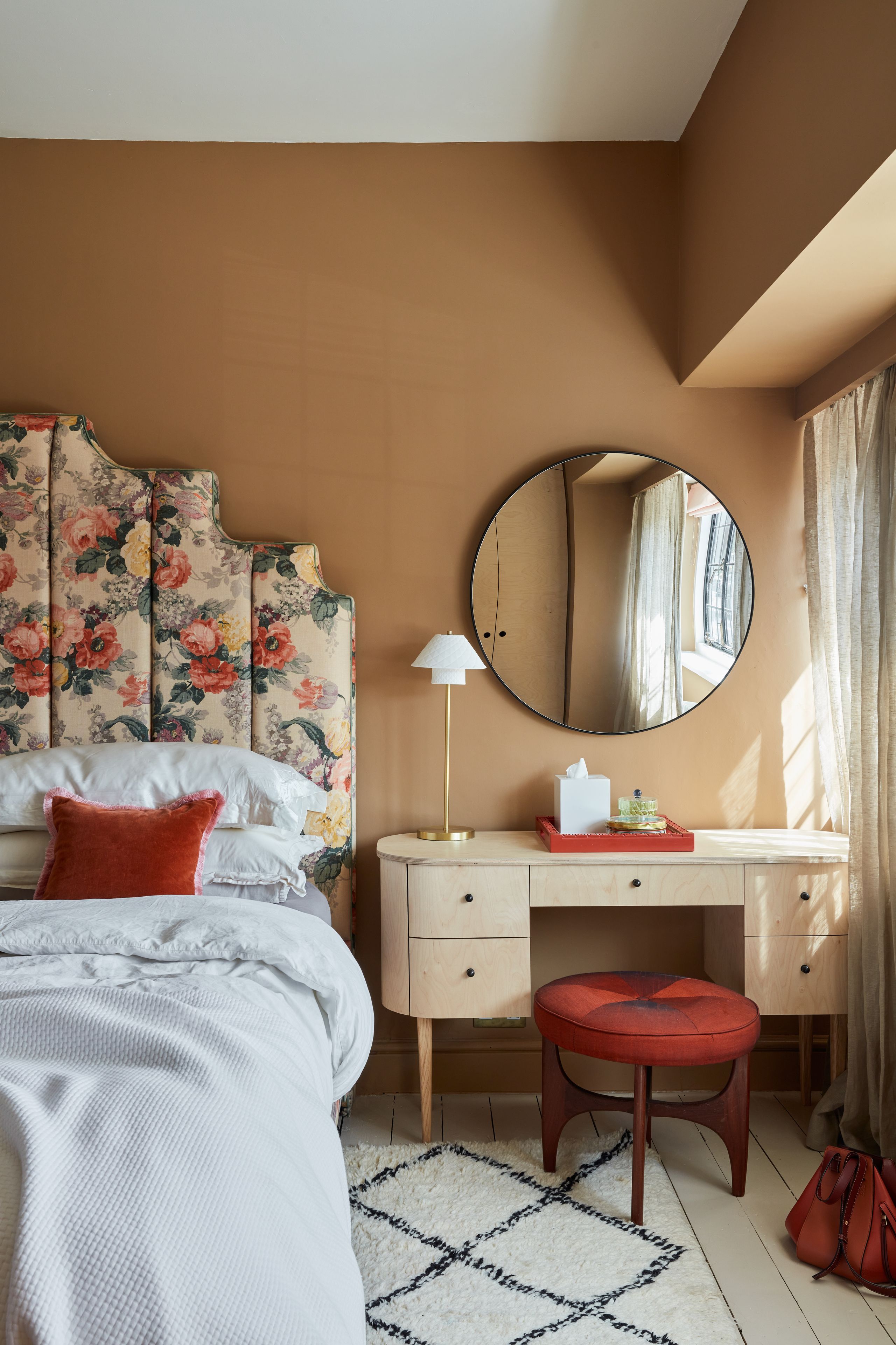 Image may contain: Home Decor, Lamp, Cushion, Accessories, Bag, Handbag, Indoors, Interior Design, Furniture, Rug, and Desk