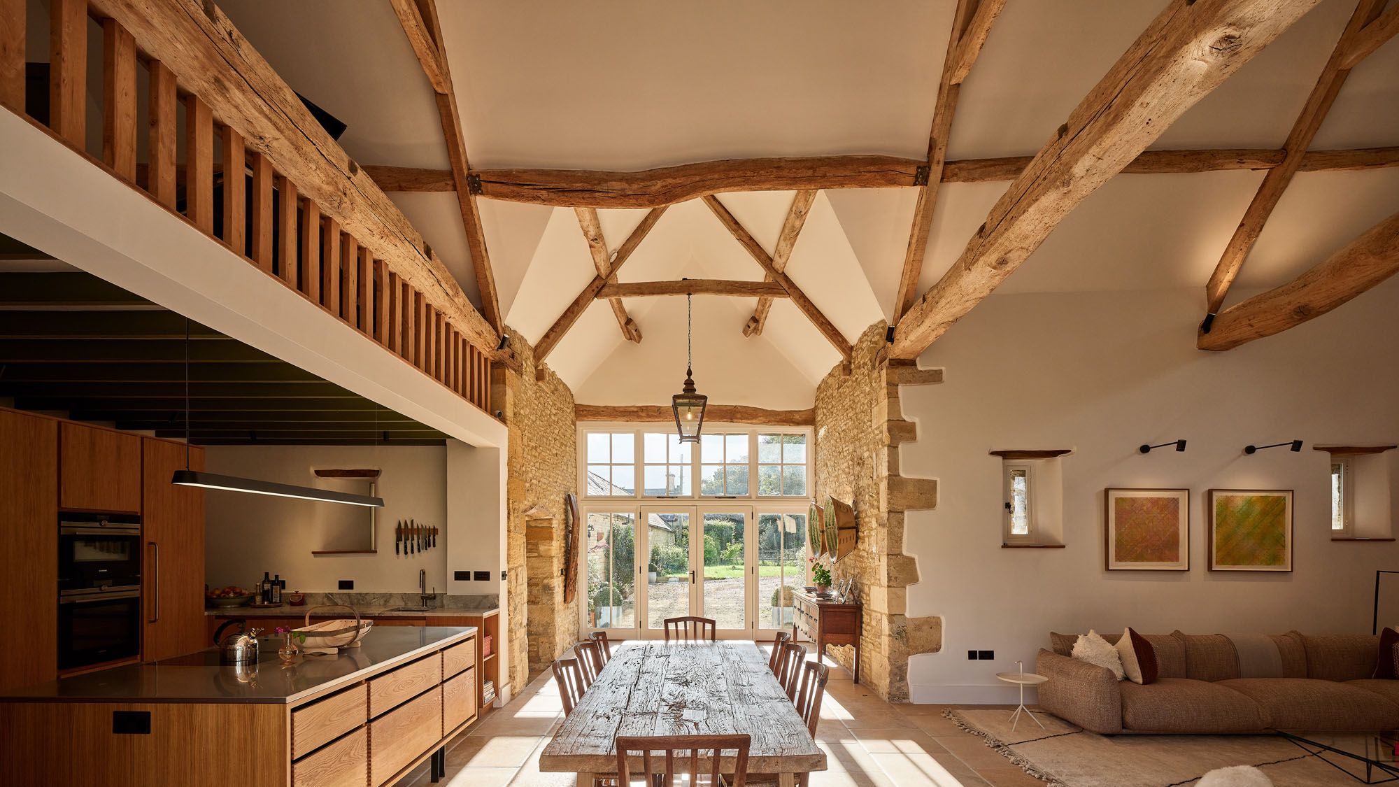 Image may contain: Indoors, Interior Design, Lamp, Floor, Chair, Furniture, Home Decor, Rug, Wood, Flooring, and Architecture