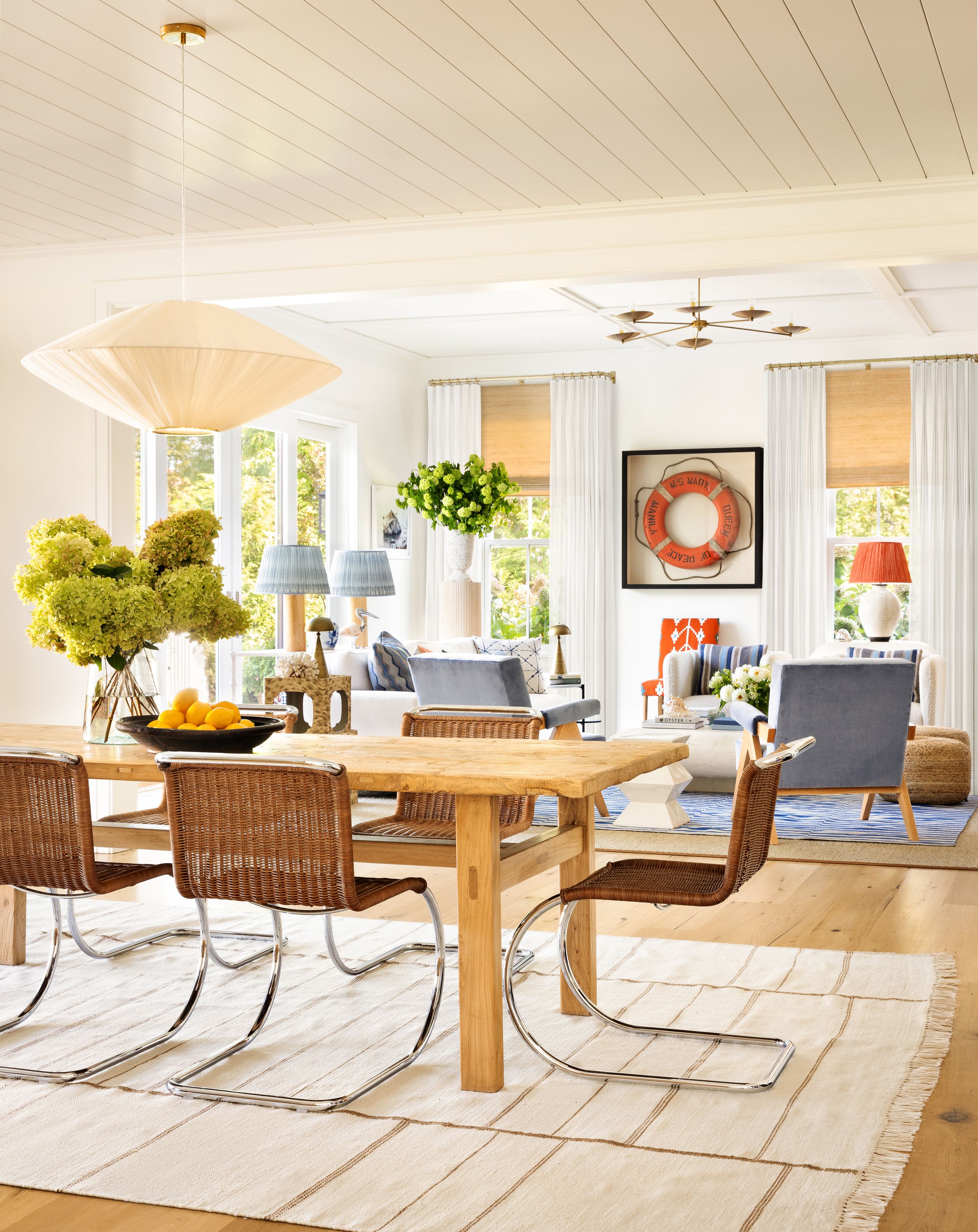 Image may contain: Architecture, Building, Dining Room, Dining Table, Furniture, Indoors, Room, Table, Home Decor, and Lamp