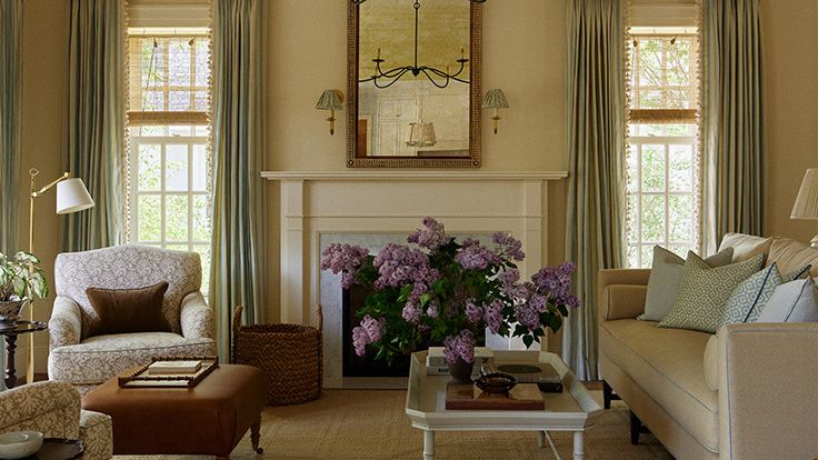 Image may contain: Home Decor, Lamp, Plant, Couch, Furniture, Coffee Table, Table, Desk, Architecture, Building, and Indoors