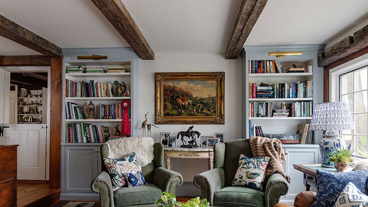 Image may contain: Lamp, Home Decor, Art, Painting, Furniture, Plant, Rug, Couch, Chair, Architecture, Building, and Indoors