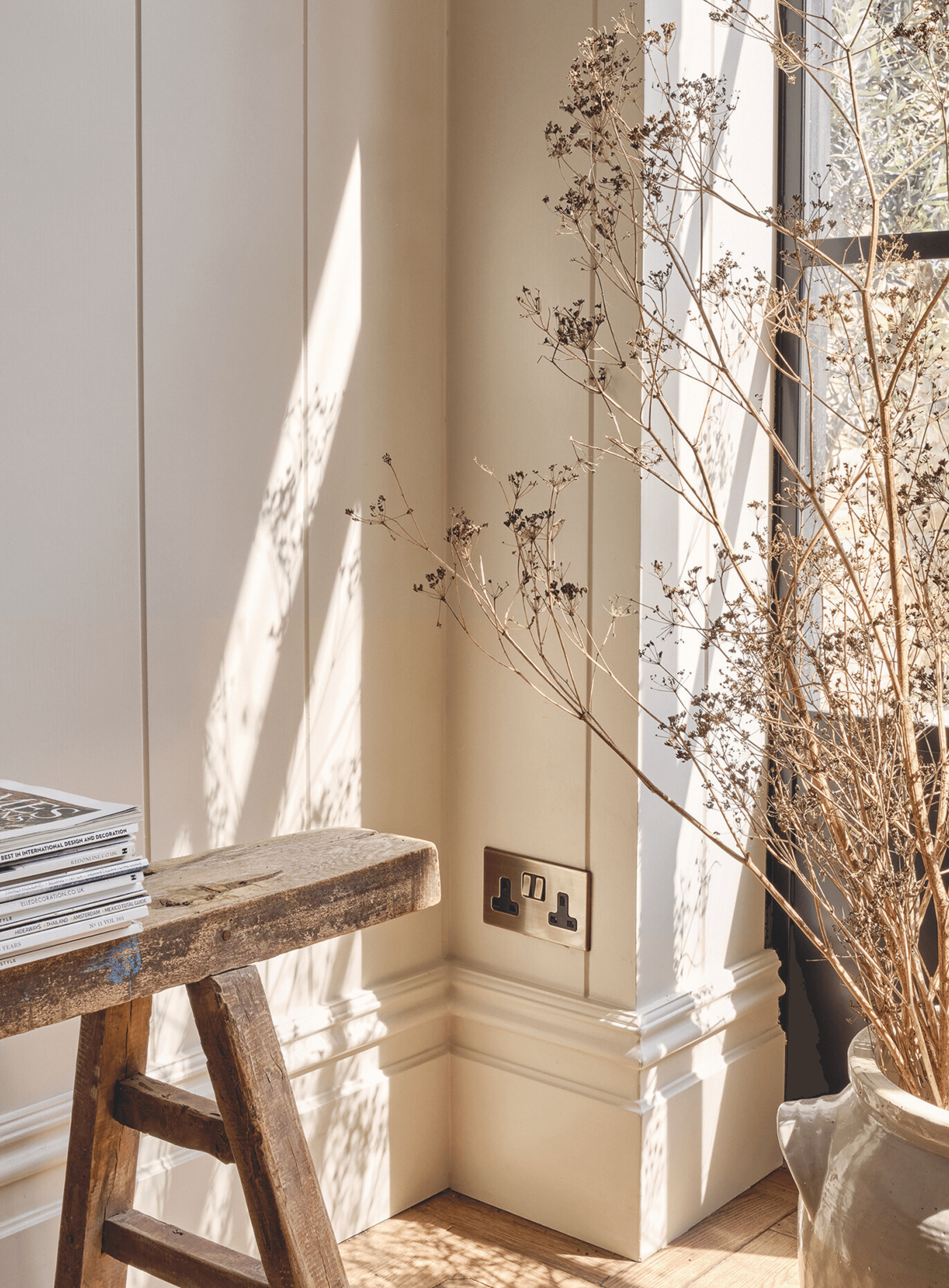 Image may contain: Indoors, Interior Design, Wood, Plywood, Window, Windowsill, Architecture, Building, Wall, and Plant