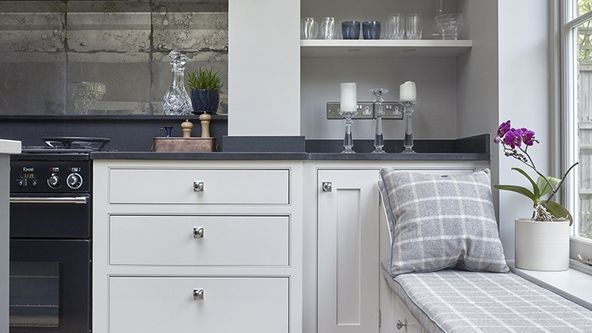 Image may contain: Indoors, Interior Design, Plant, Cup, Candle, Kitchen, Furniture, Cushion, Home Decor, and Bed