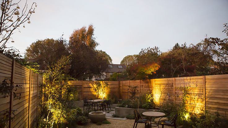 Image may contain: Backyard, Nature, Outdoors, Yard, Indoors, Interior Design, Garden, Chair, Furniture, Desk, and Table