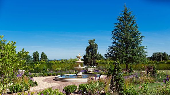 Image may contain: Garden, Nature, Outdoors, Grass, Park, Plant, Architecture, Fountain, Water, Scenery, Backyard, and Yard