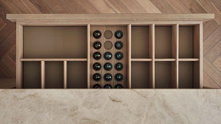 Image may contain: Alcohol, Beverage, Liquor, Wine, Electronics, Speaker, and Wine Cellar