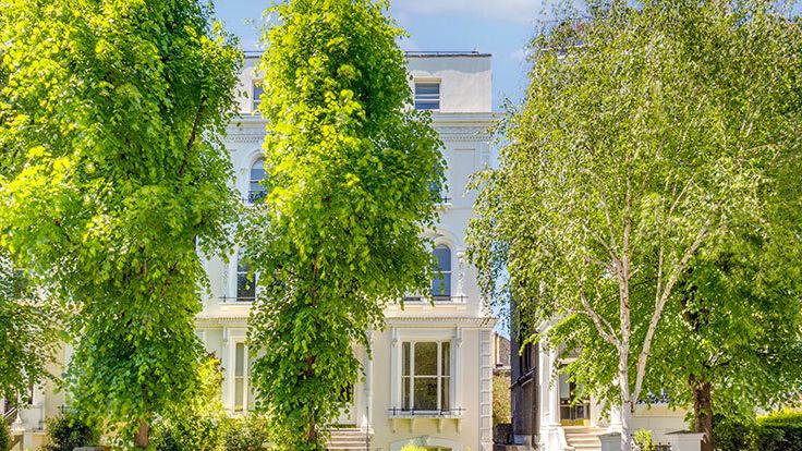 Image may contain: Architecture, Building, Housing, Car, Transportation, Vehicle, Bicycle, Neighborhood, City, and House