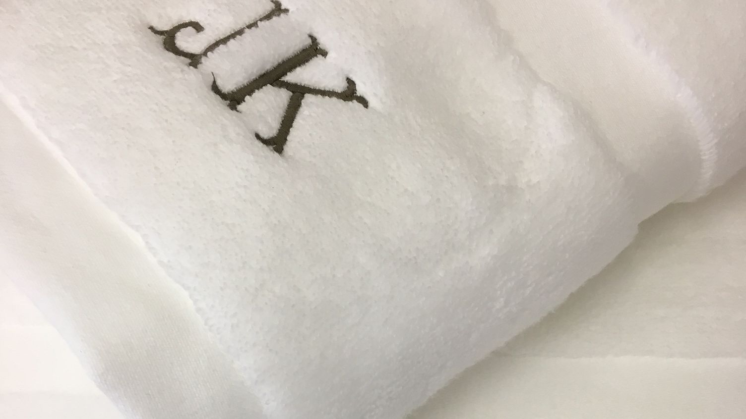 Image may contain: Bath Towel, Towel, and Text