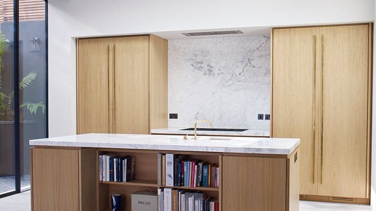 Image may contain: Indoors, Interior Design, Furniture, Sideboard, Closet, Cupboard, Box, Sink, Sink Faucet, and Cabinet