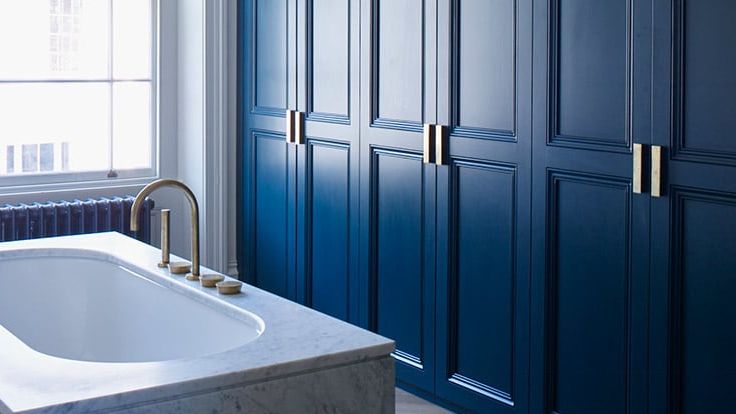 Image may contain: Indoors, Interior Design, Bathing, Tub, Bathtub, Person, and Hot Tub