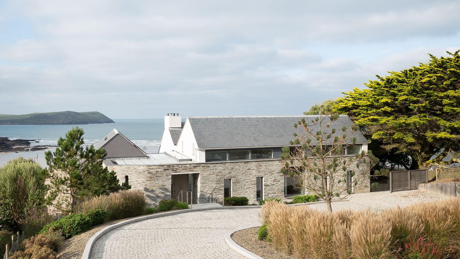 Image may contain: Outdoors, Architecture, Building, Housing, Nature, Scenery, House, Aerial View, and Driveway