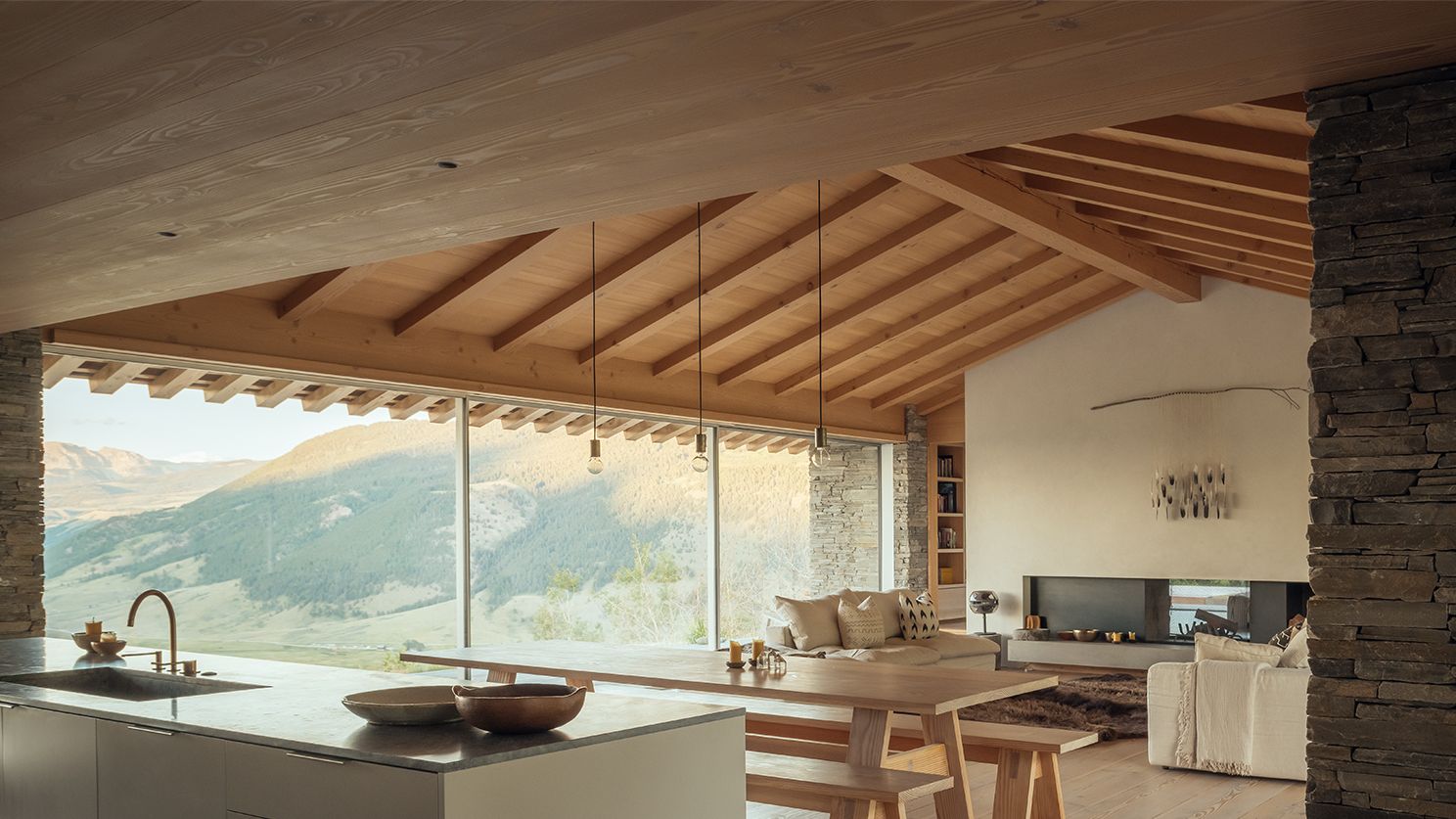 Image may contain: Indoors, Interior Design, Wood, Sink, Sink Faucet, Bench, Furniture, Couch, Kitchen, and Dining Table