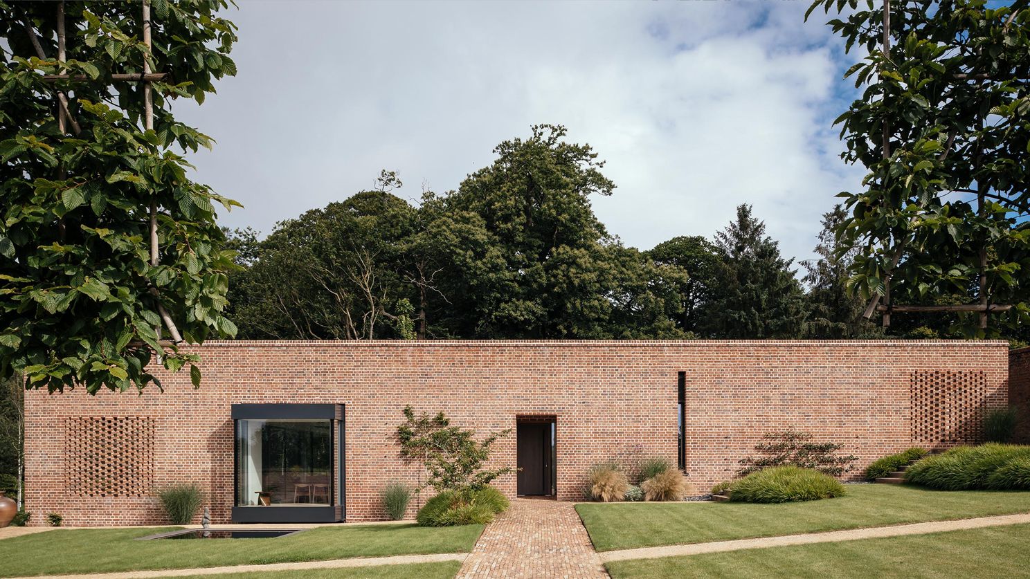 Image may contain: Grass, Plant, Architecture, Building, House, Housing, Villa, Lawn, Vegetation, Tree, and Outdoors