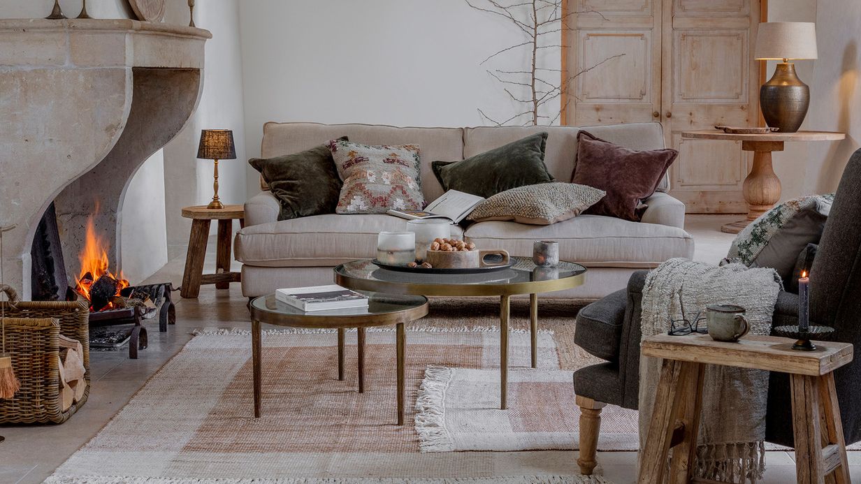 Image may contain: Coffee Table, Furniture, Table, Home Decor, Couch, Architecture, Building, Indoors, Living Room, and Room