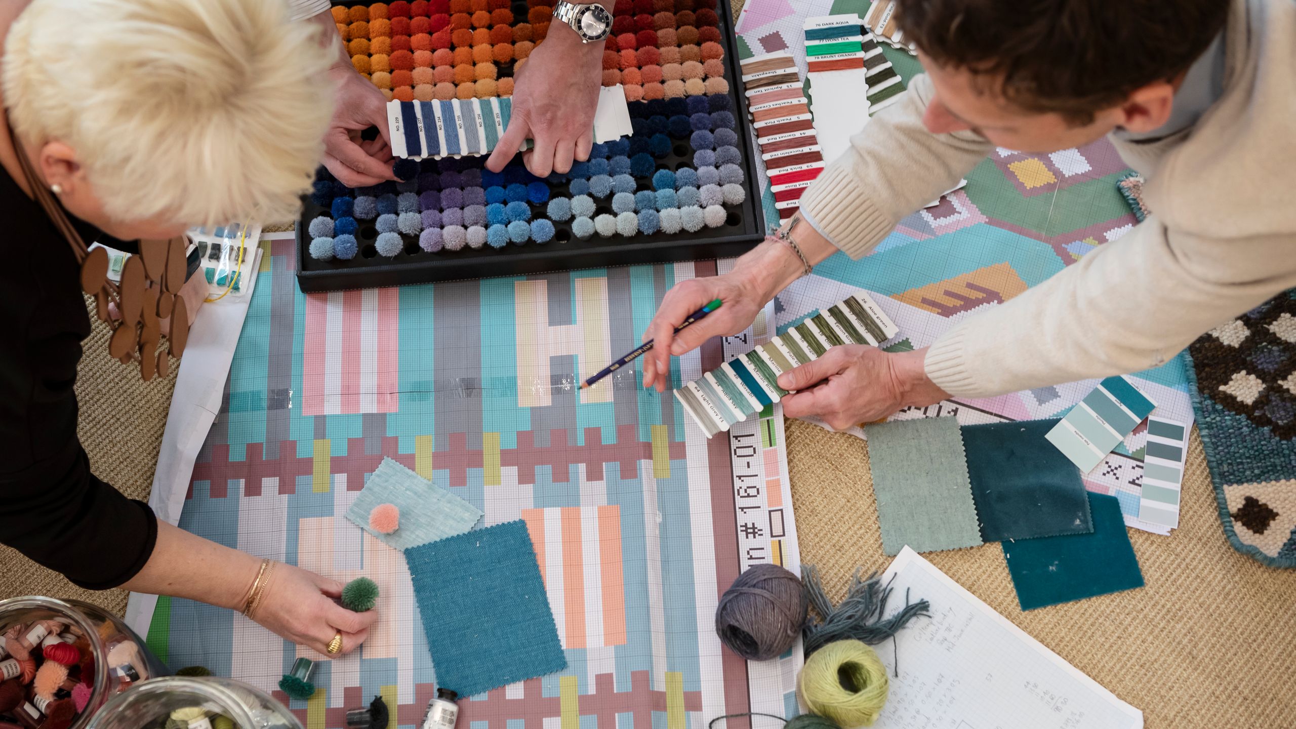 Image may contain: Wristwatch, Pen, Adult, Person, Child, Accessories, Bracelet, Jewelry, Baby, Ring, and Necklace