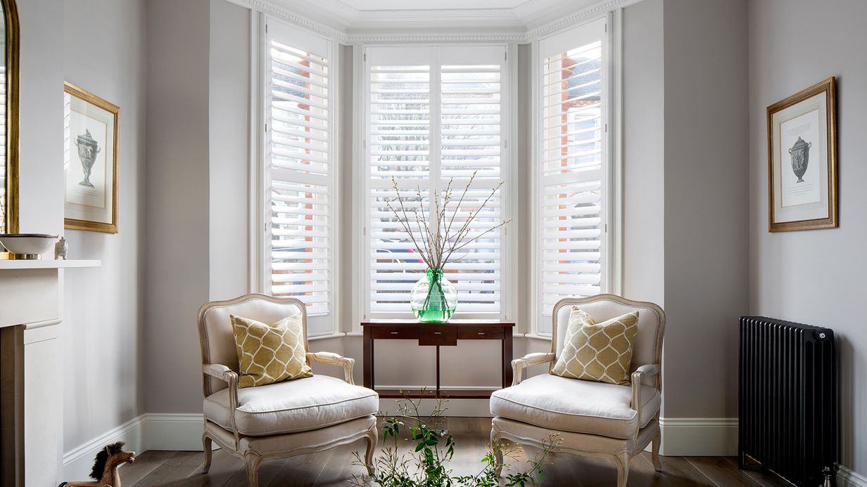 Image may contain: Window, Chair, Furniture, Bay Window, Art, Painting, Plant, Home Decor, Animal, Canine, Dog, and Mammal