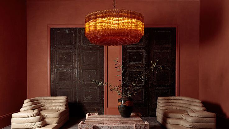 Image may contain: Lamp, Architecture, Building, Furniture, Indoors, Living Room, Room, Chandelier, and Interior Design